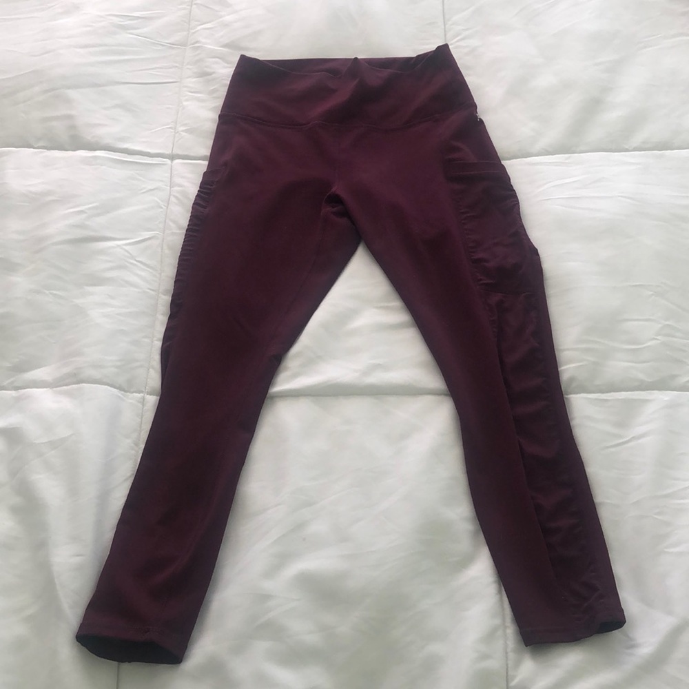 Fabletics Powerhold plum purple leggings with side pockets and side mesh
